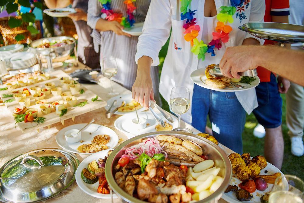 people taking food at a party